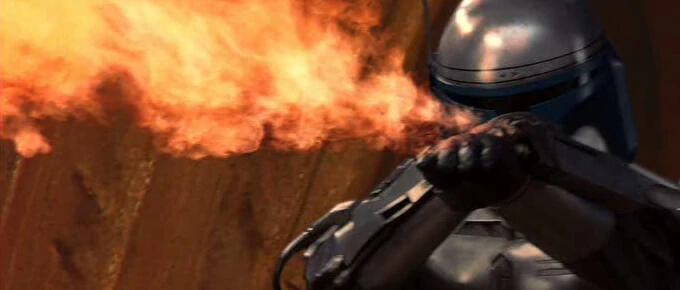 Standard flamethrower on her left gauntlet. Underneath that gauntlet is a concussive stun-round launcher.